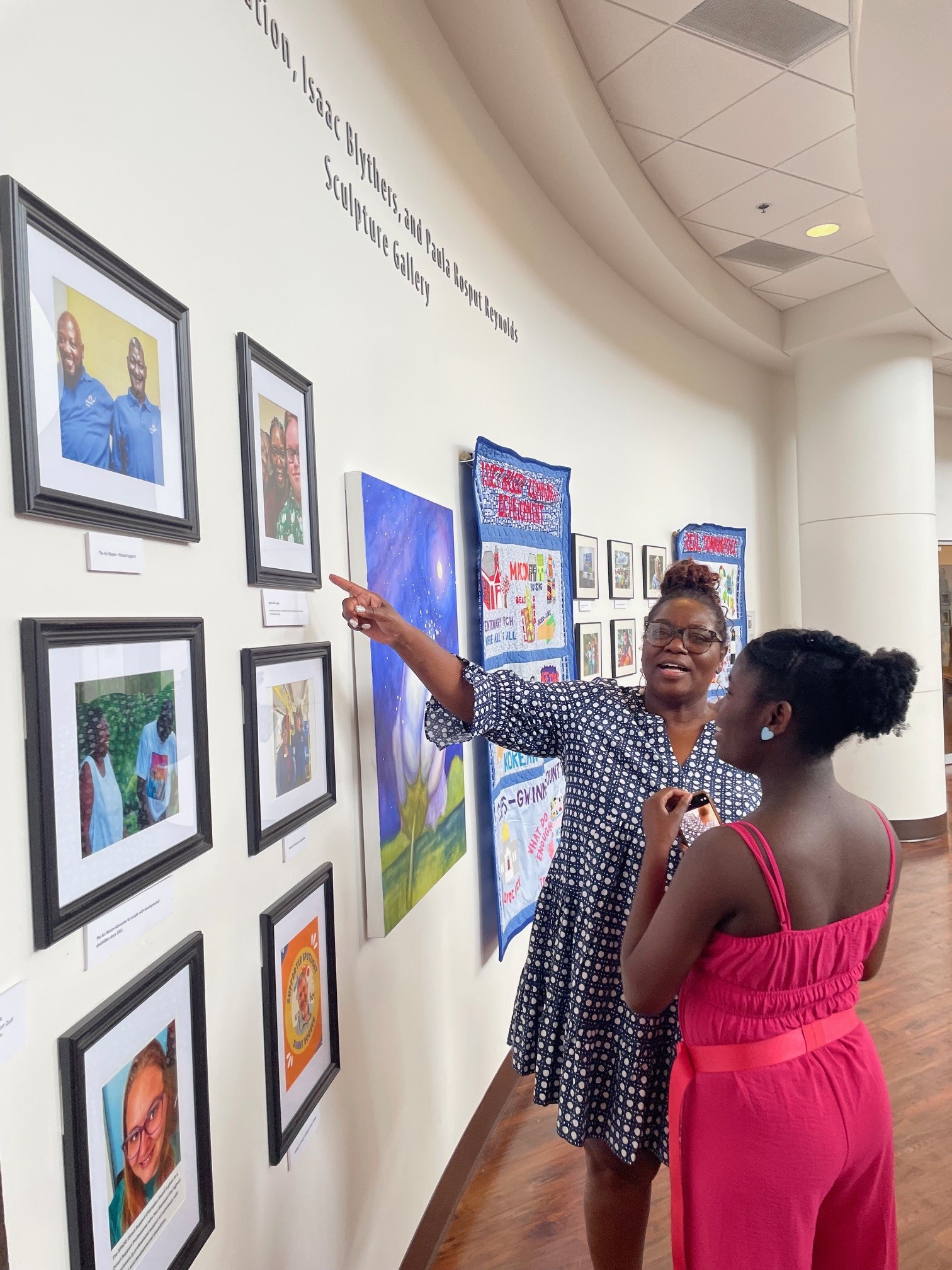 Visitors at the Embracing Possibilities Exhibit